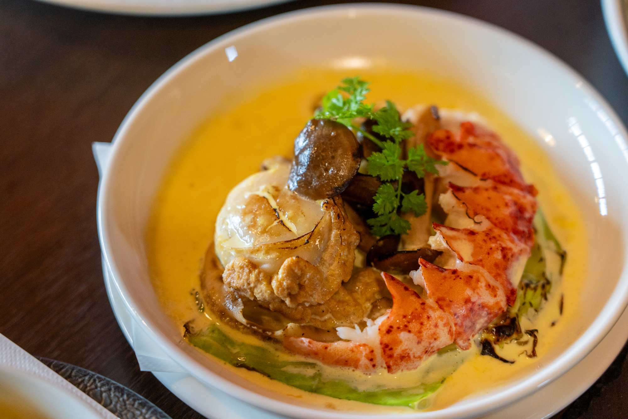 魚料理（海老とホタテのバターソテー）